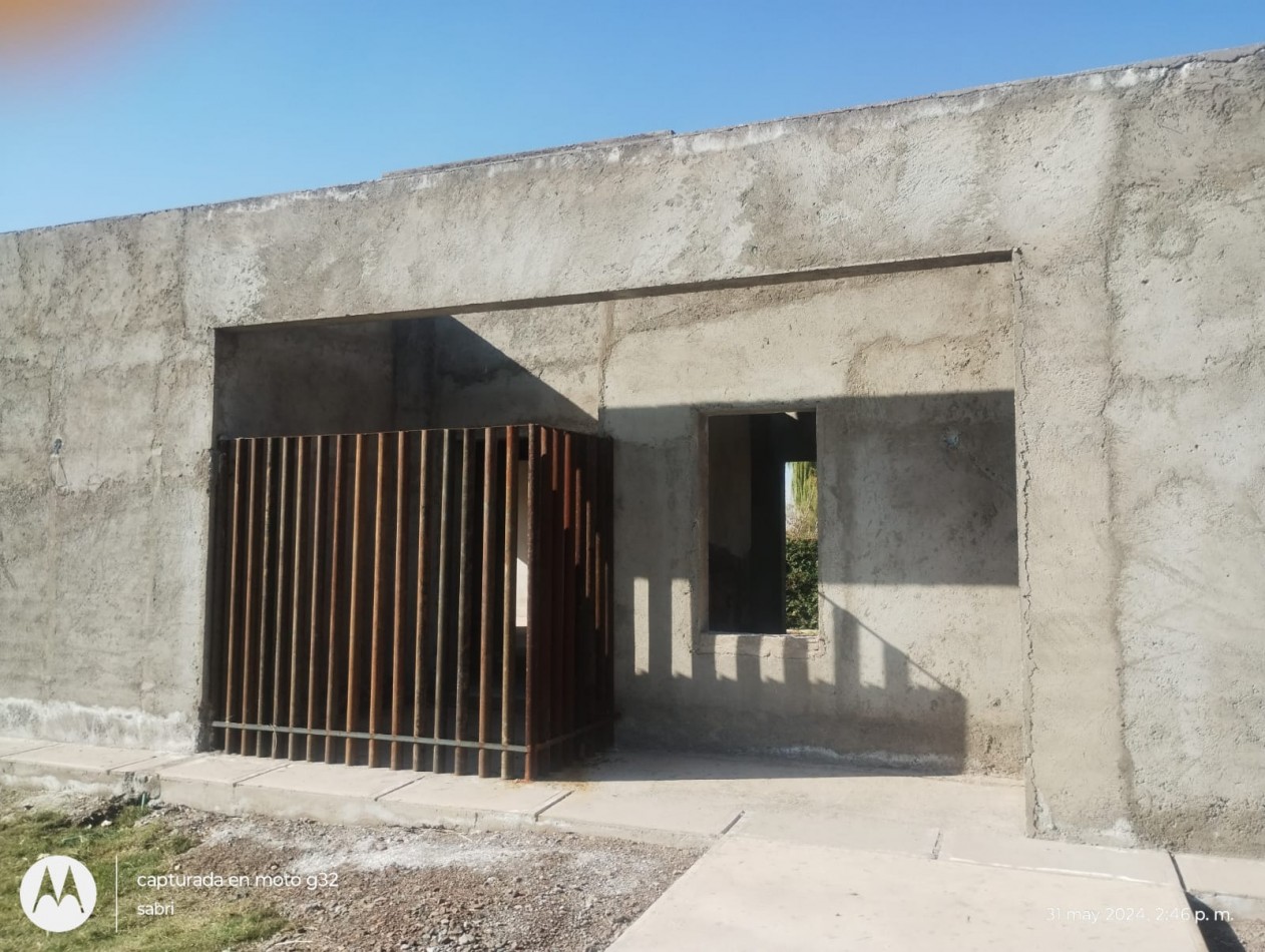 GREENWOOD VENDE CASA EN OBRA GRUESA EN EL BARRIO PRIVADO RANCHOS DE LA MERCED, LUNLUNTA, MAIPU.