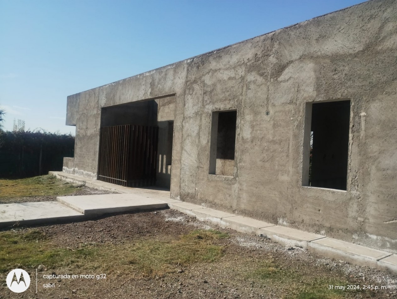 GREENWOOD VENDE CASA EN OBRA GRUESA EN EL BARRIO PRIVADO RANCHOS DE LA MERCED, LUNLUNTA, MAIPU.