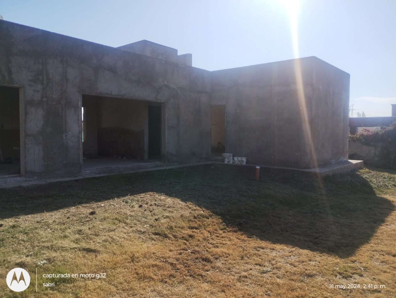 GREENWOOD VENDE CASA EN OBRA GRUESA EN EL BARRIO PRIVADO RANCHOS DE LA MERCED, LUNLUNTA, MAIPU.