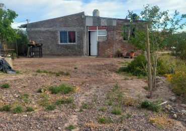 Venta de Lote con Quincho en Barrio Las Lomas.